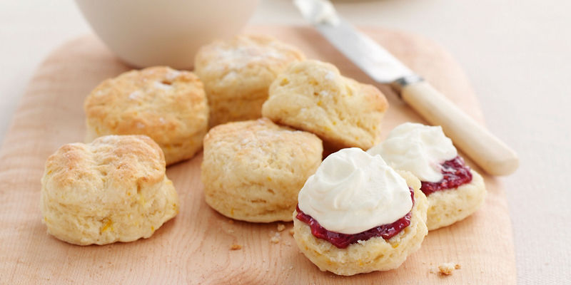 Fresh scones with cream and jam