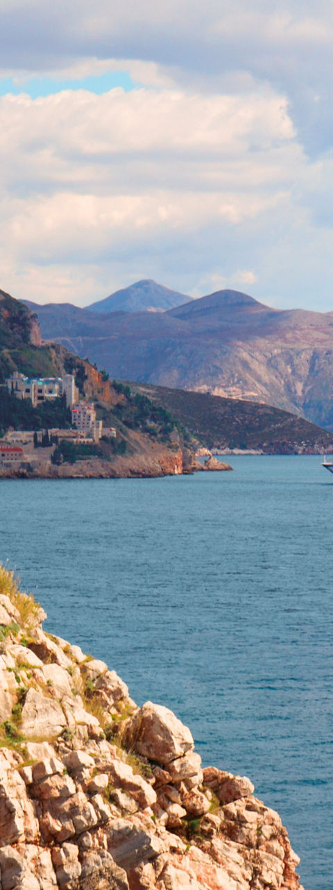 Scenic coastal fortress with cruise ship view