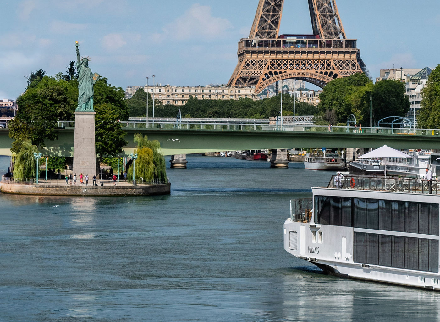 Eiffel Tower view with Seine River cruise
