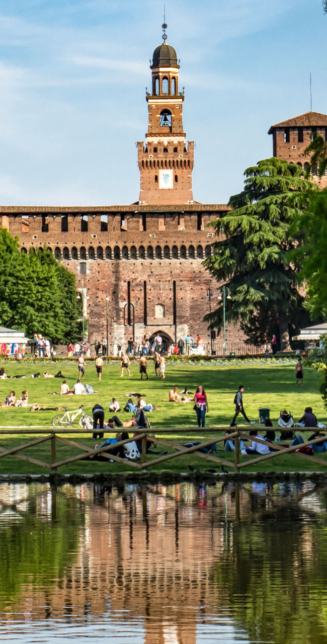 Historic castle with park and pond view
