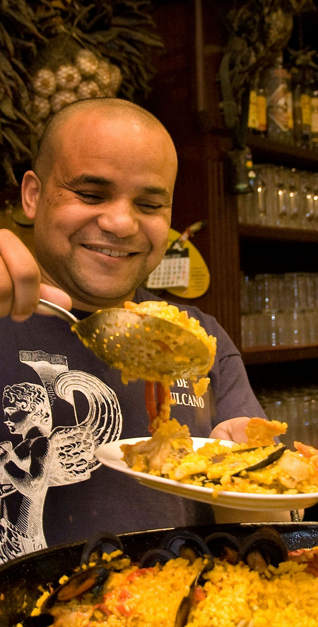 Traditional Spanish Paella in Rustic Setting