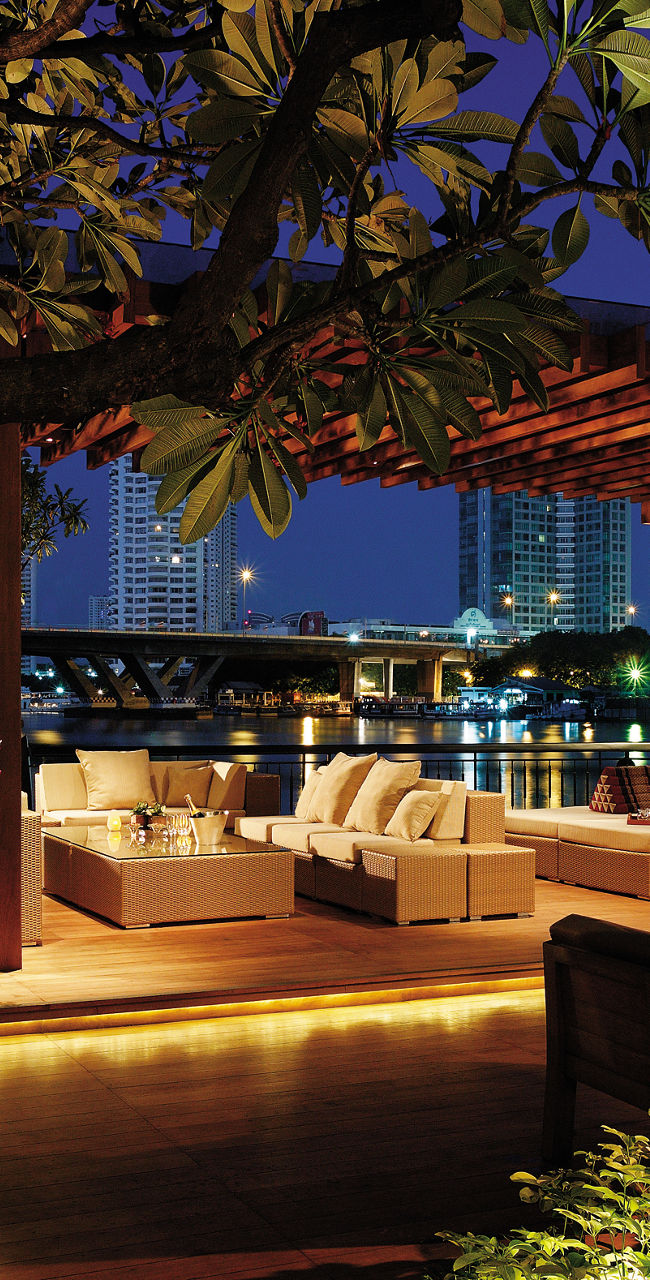 Luxurious outdoor lounge by riverside