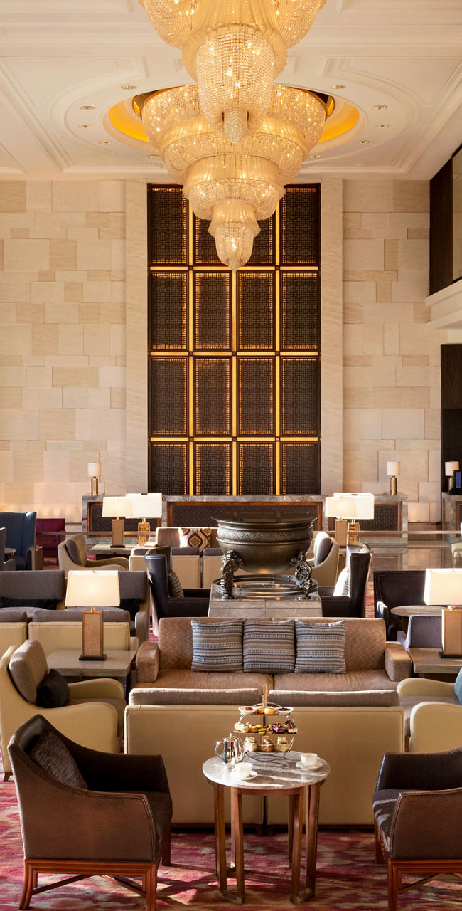Luxurious hotel lobby with grand chandeliers