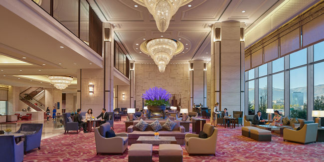 Luxurious hotel lobby with grand chandeliers