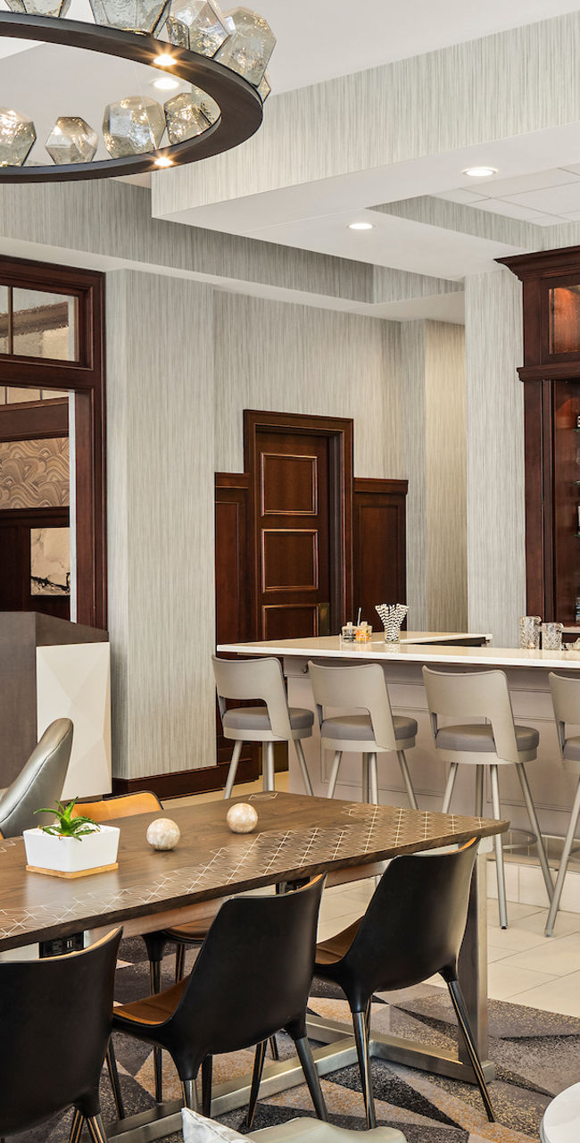 Modern lounge with bar and fireplace