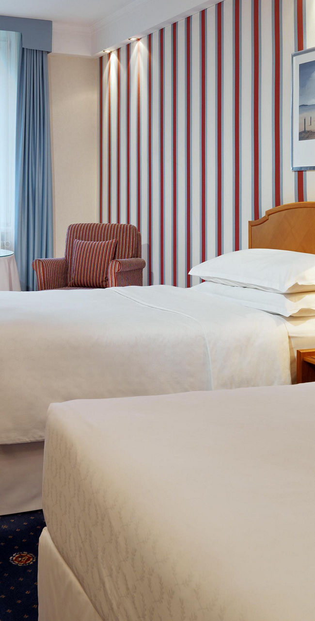 Cozy hotel room with twin beds