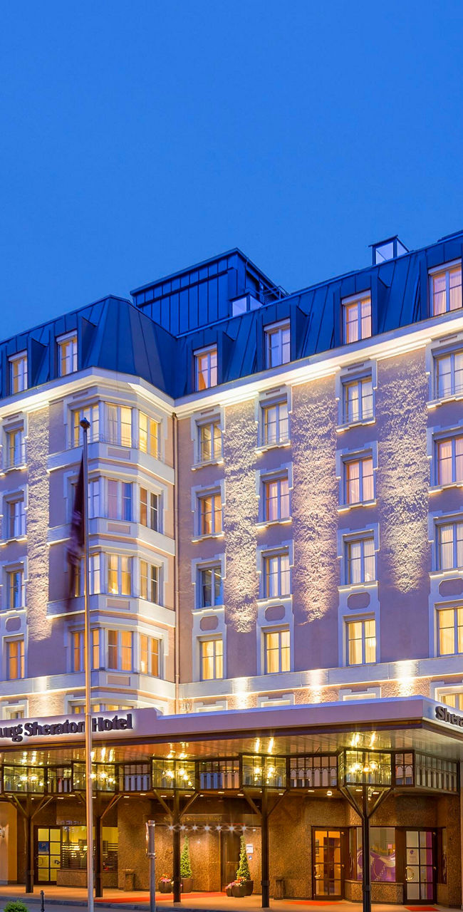 Elegant hotel exterior at twilight