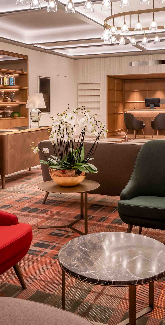 Modern hotel lounge with stylish seating and lighting