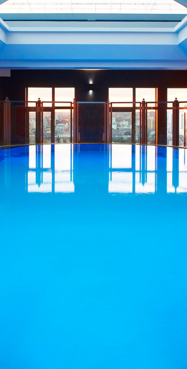 Indoor swimming pool with skylight ceiling