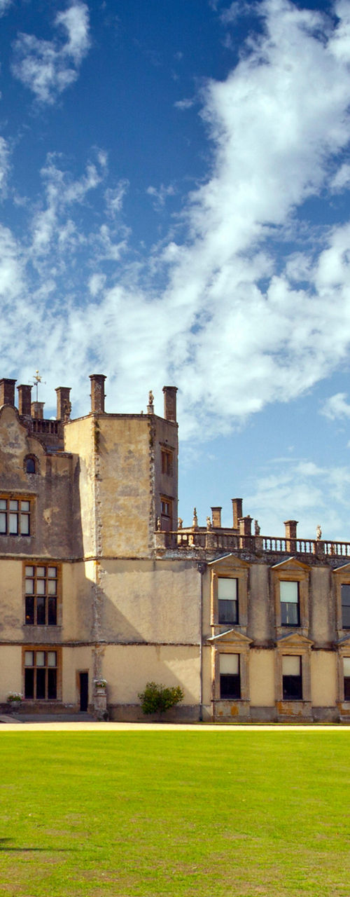 Historic castle under vibrant blue sky