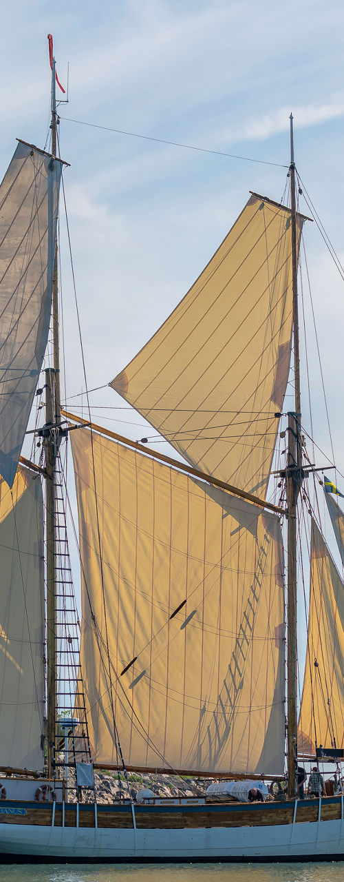 Historic sailing ship on calm waters