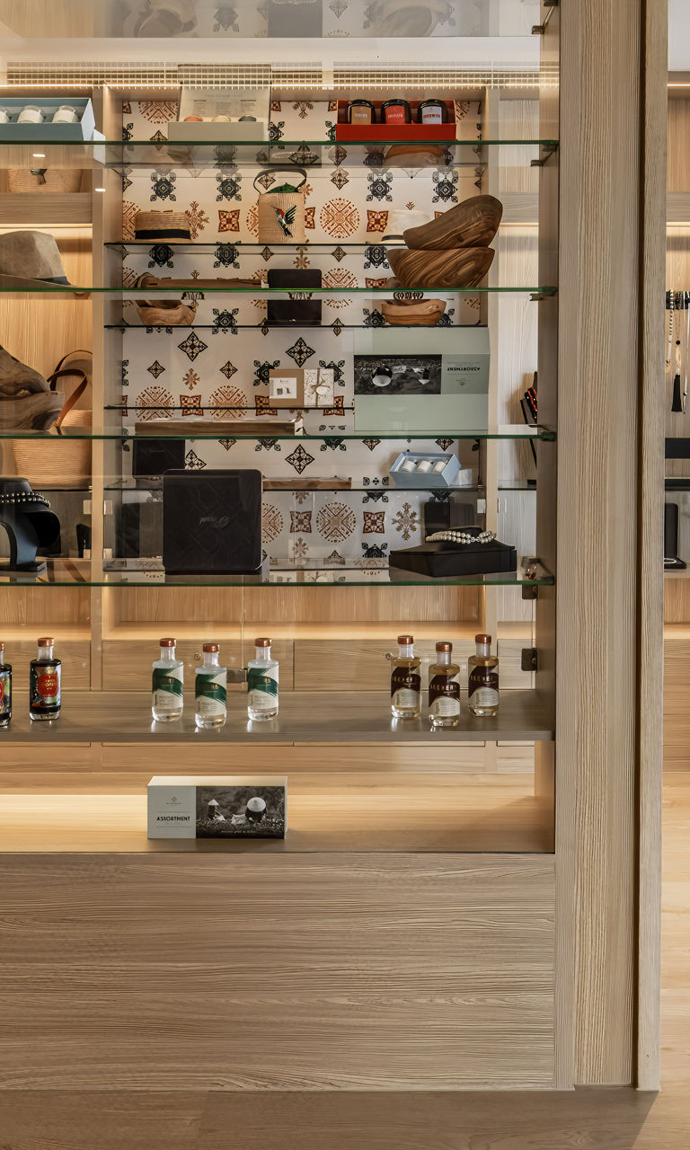 Modern Retail Display with Glass Shelves and Wooden Accents