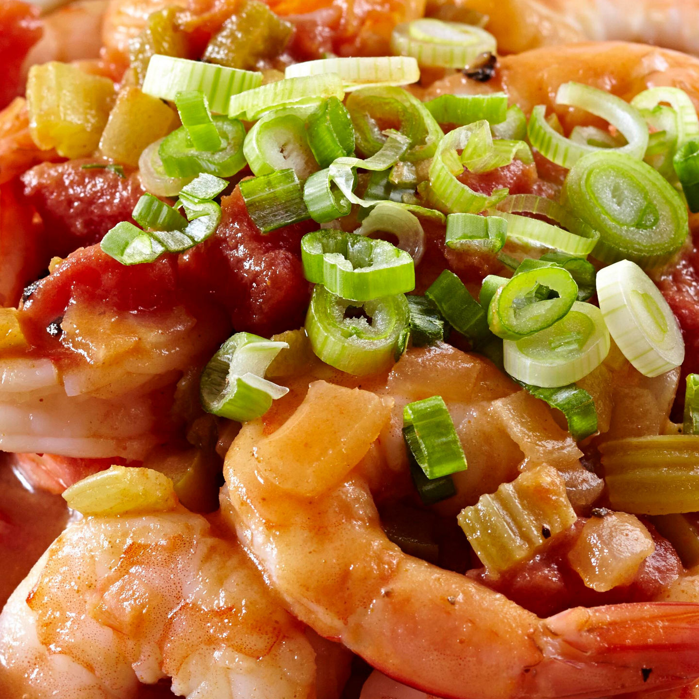 Shrimp stew with vegetables in white bowl