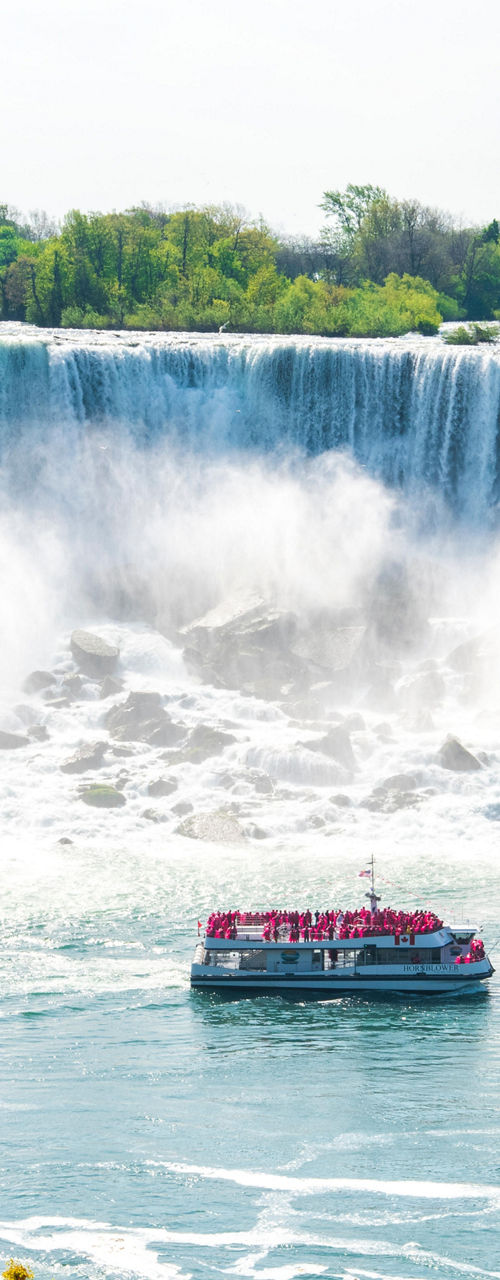 Tour boat approaching Niagara Falls mist