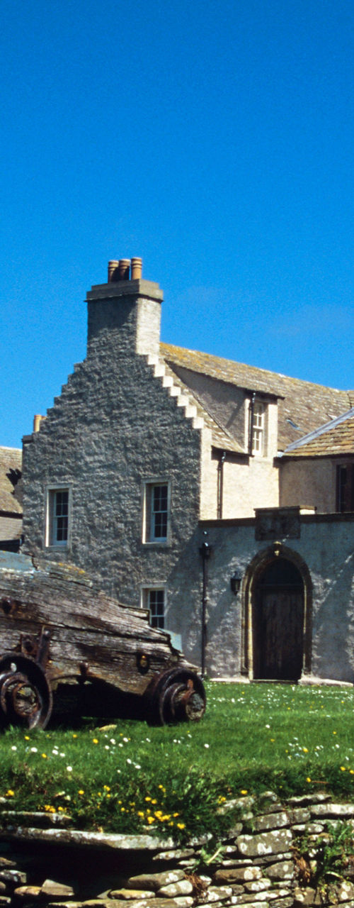 Historic stone house with rustic setting