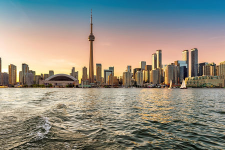 Toronto skyline at sunset with waterfront view