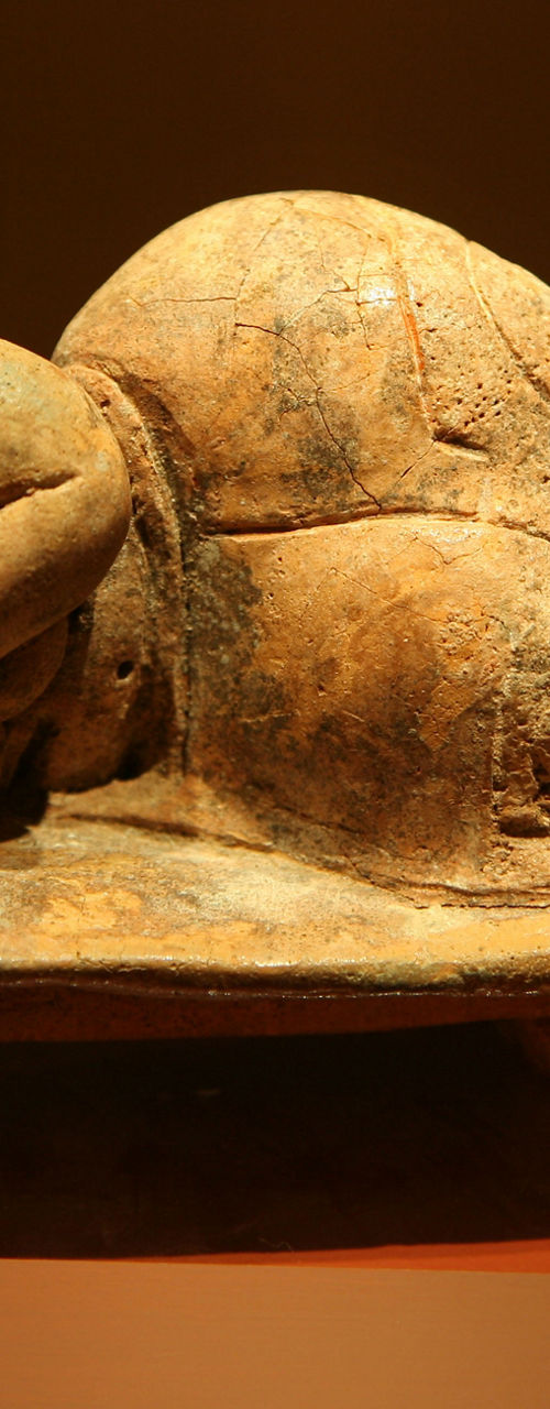 Ancient sculpture of mother and child