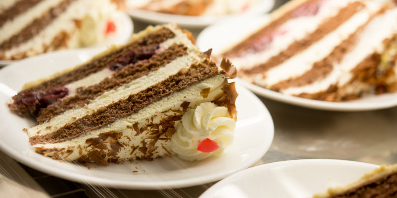 Layered chocolate and cream cake slices