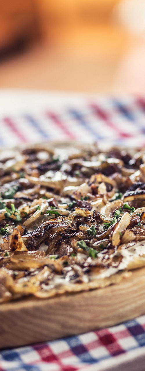 Rustic flatbread with beer and mug