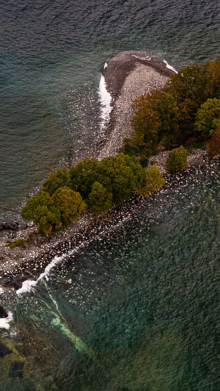 Aerial view of small forested island