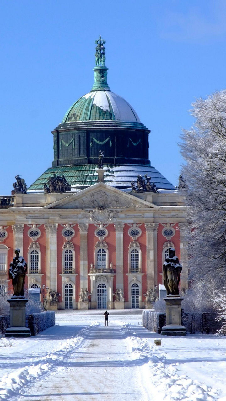 Historic palace in snowy winter landscape