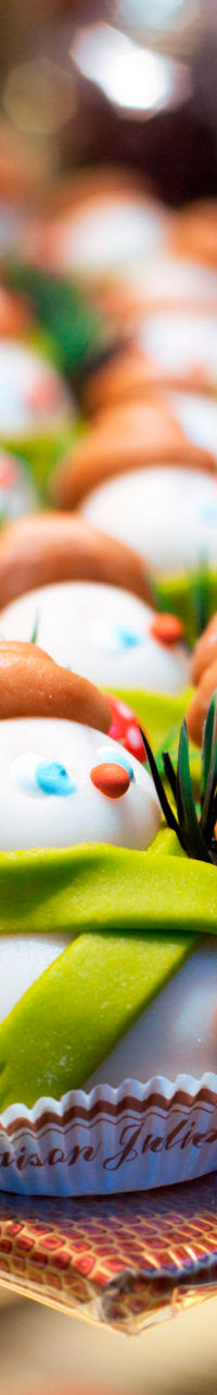 Festive snowman cupcakes in bakery display