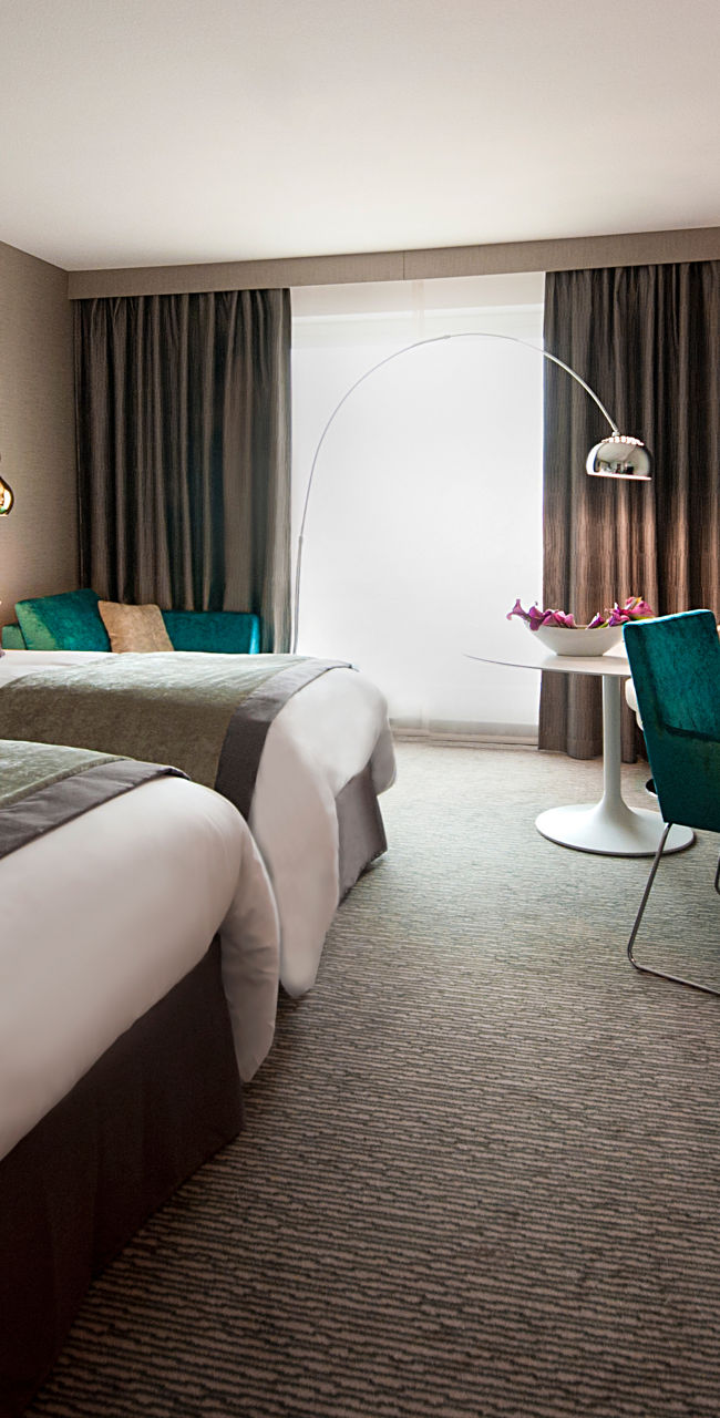 Modern hotel room with twin beds