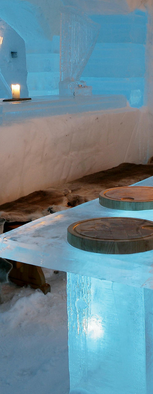 Ice dining room with glowing blue accents