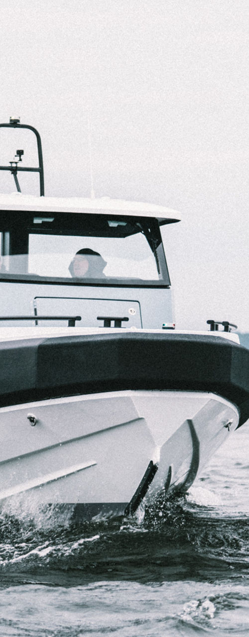 Modern motorboat cruising on open water