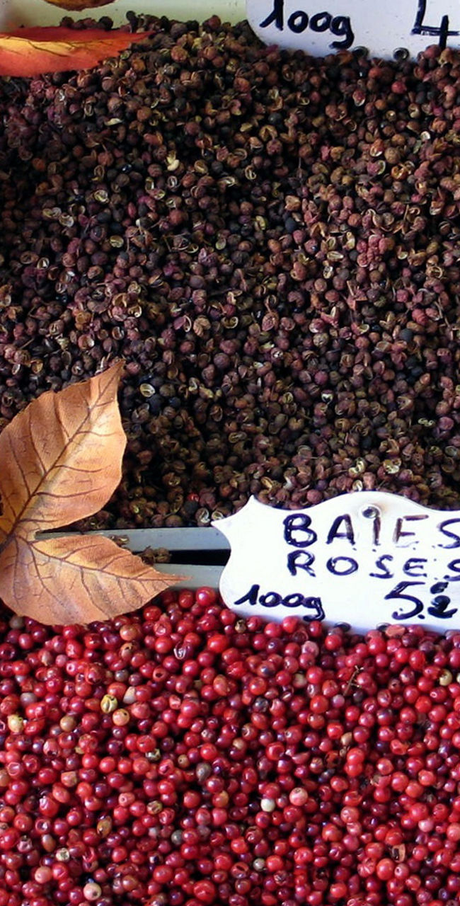 Colorful spice display with autumn leaves