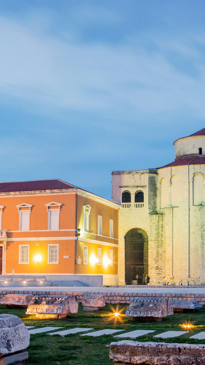 Historic church and ruins at sunset