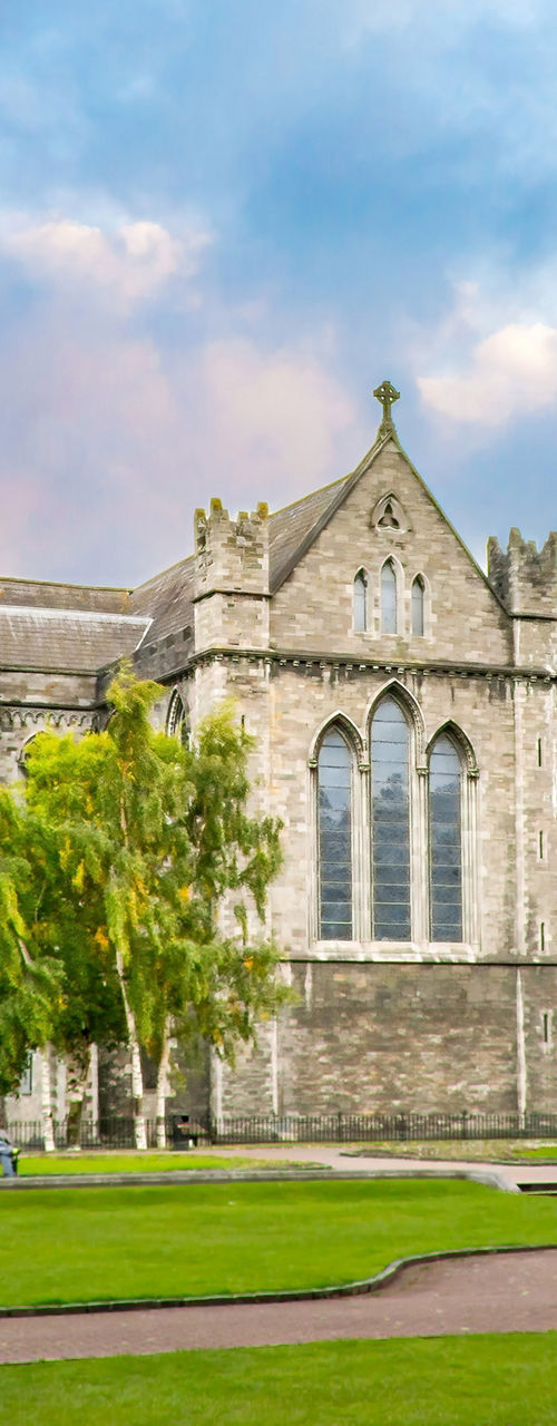 Historic Gothic Cathedral with Tower at Sunset
