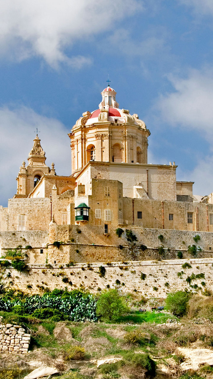 Historic stone fortress under blue sky