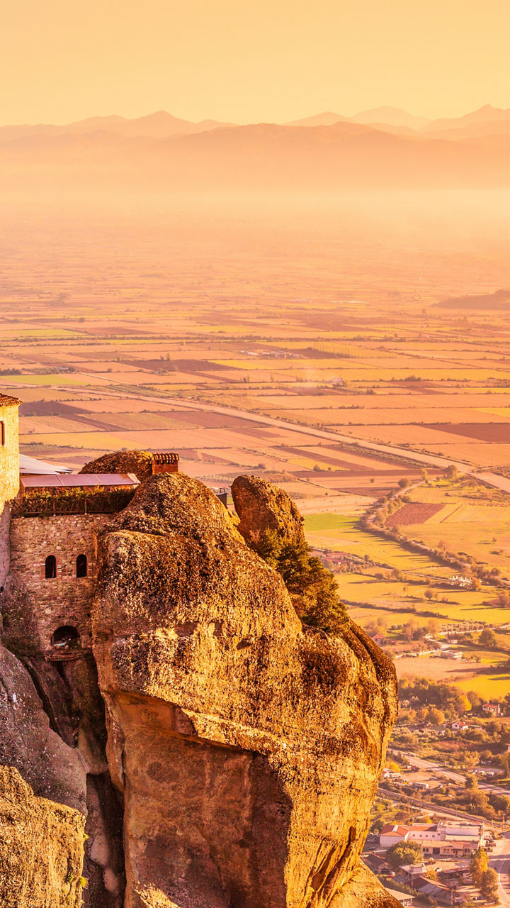 Monastery on Cliff at Sunset