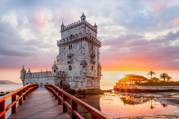 Belem Tower at Sunset with Wooden Bridge