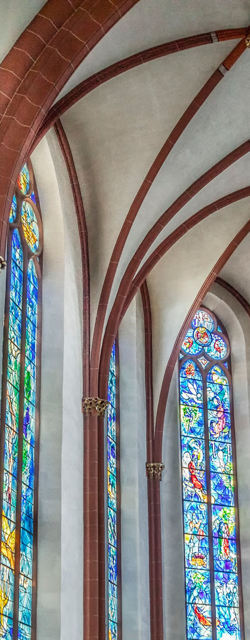 Historic church interior with stained glass windows
