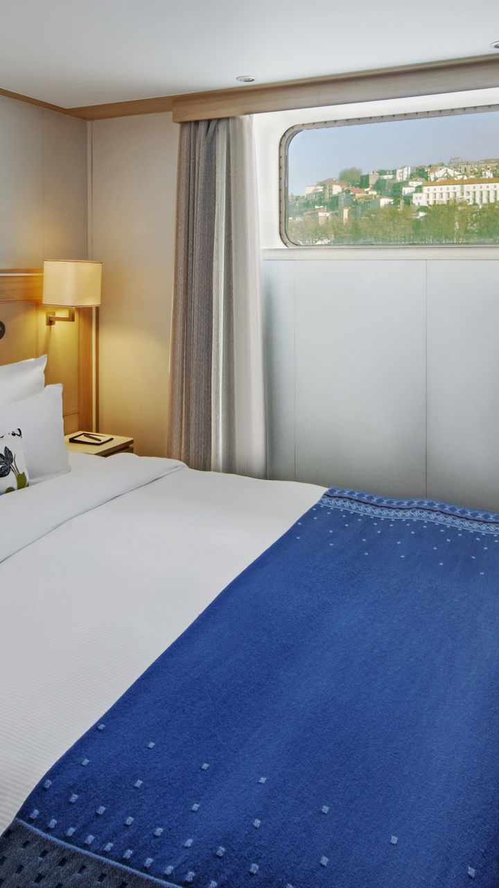Modern cruise ship cabin with window view
