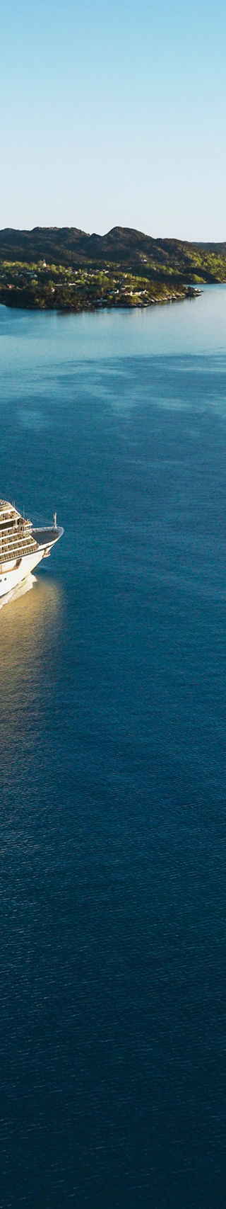 Cruise ship sailing through calm waters