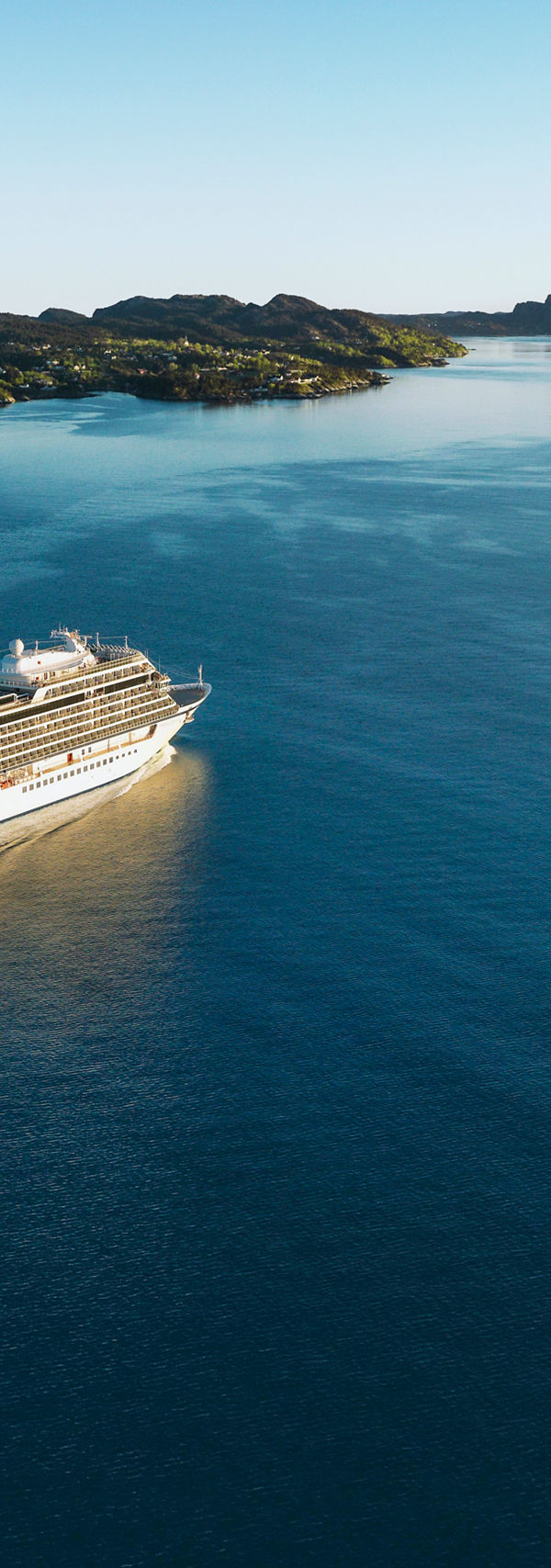 Cruise ship sailing through calm waters