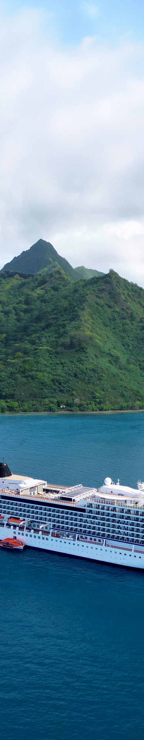 Luxury cruise ship in tropical lagoon