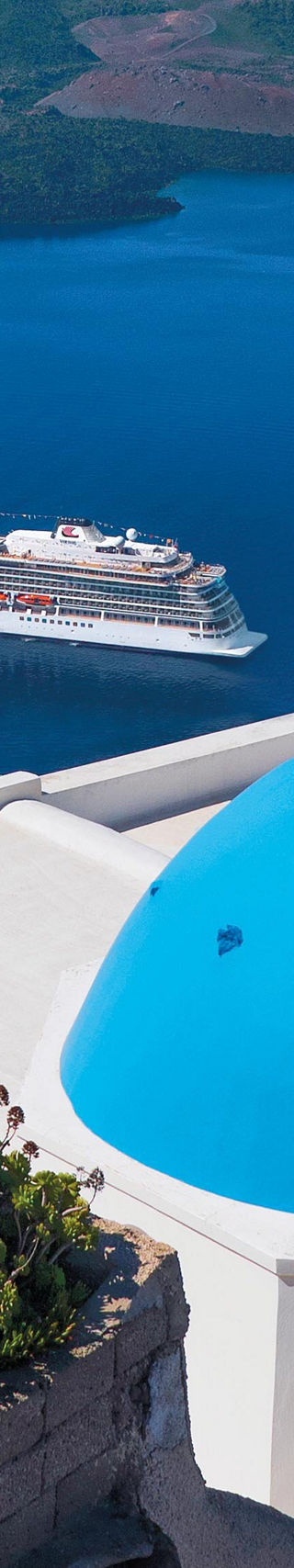Santorini view with blue dome and sea