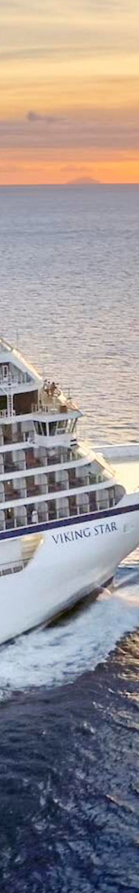 Luxury cruise ship at sunset on ocean