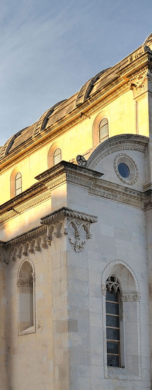 Historic stone cathedral with statue