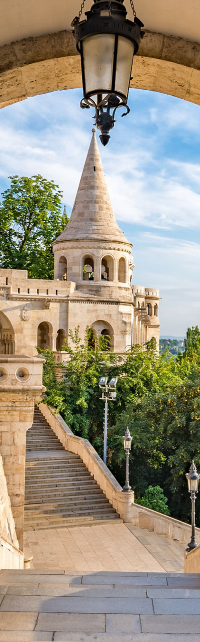 Historic stone archway with scenic view