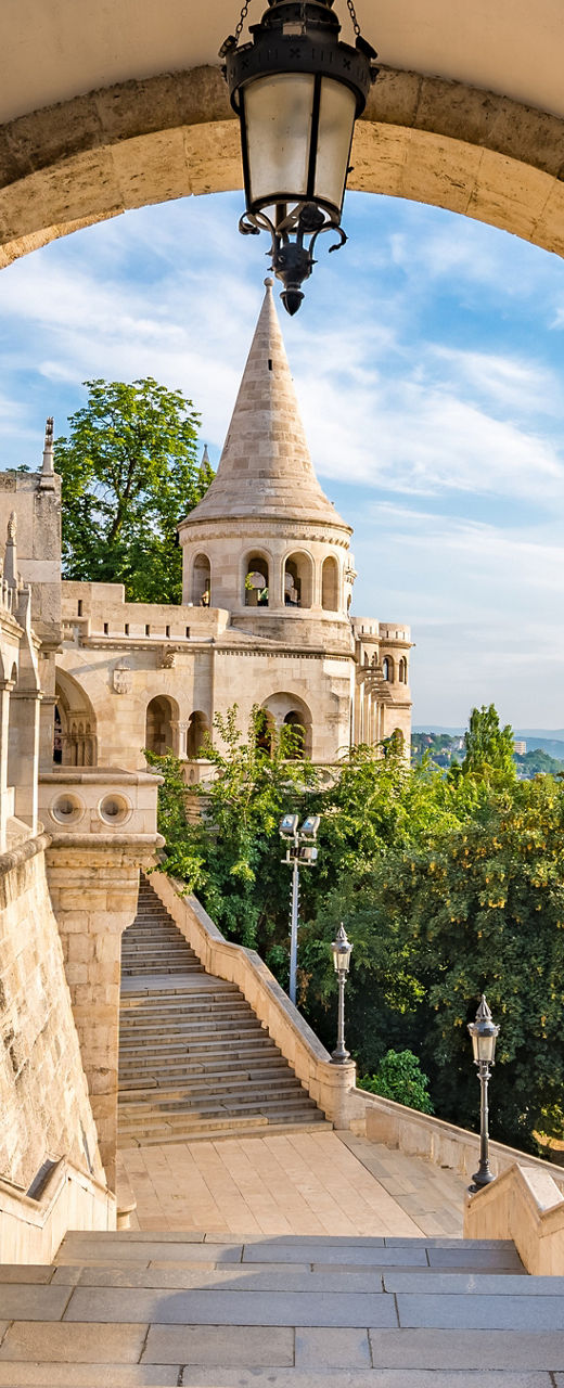 Historic stone archway with scenic view