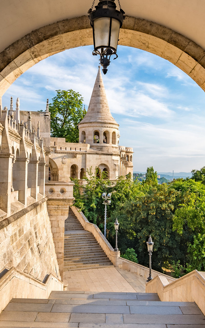 Historic stone archway with scenic view