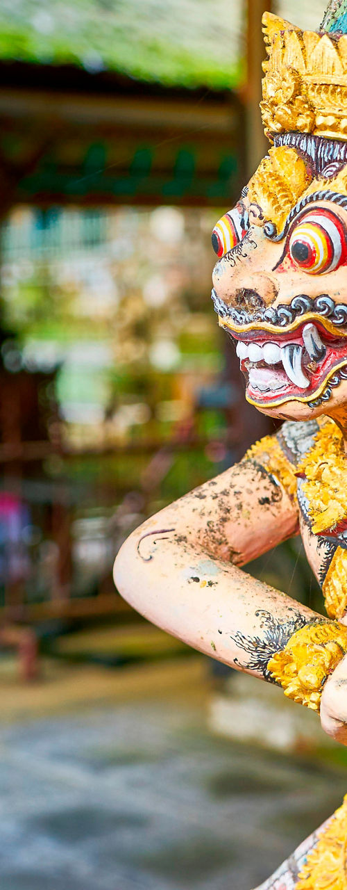 Traditional Balinese temple with ornate statues