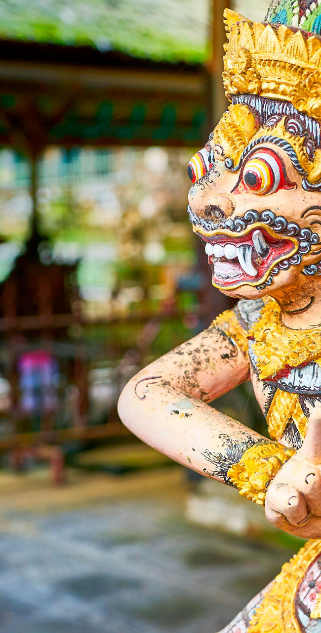 Traditional Balinese temple with ornate statues