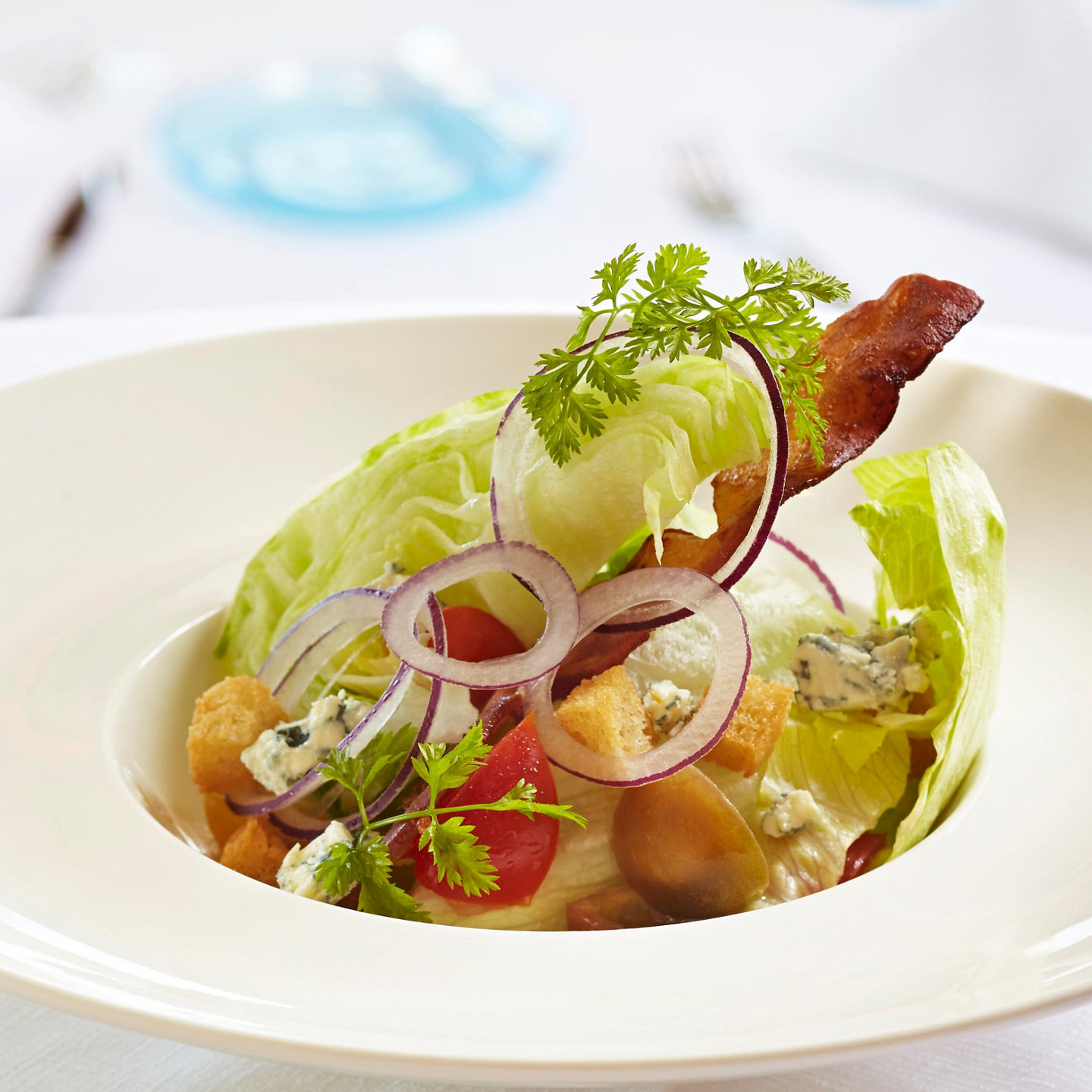 Gourmet salad with wine in fine dining
