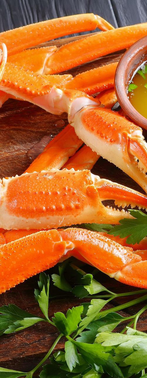 Seafood platter with crab legs and corn